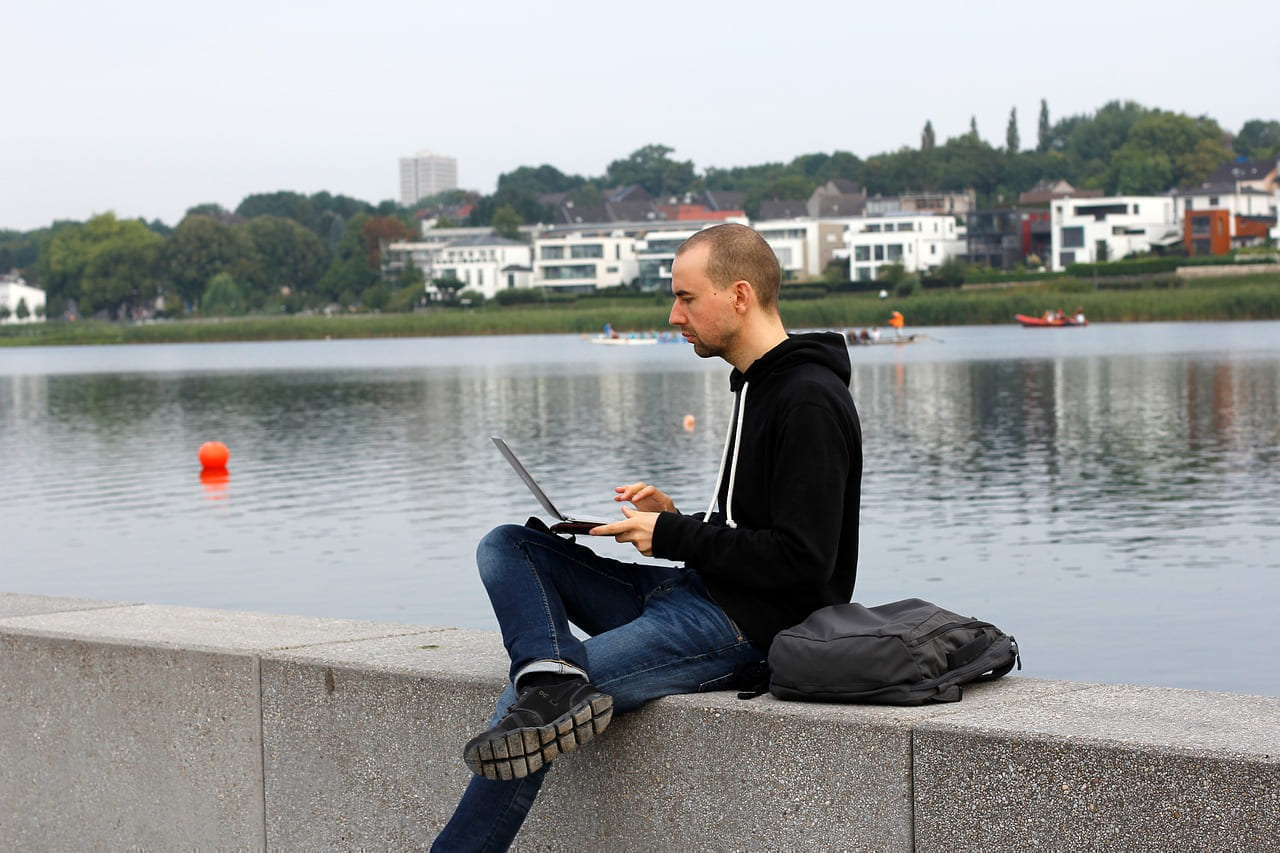 digital nomad, phoenix lake, dortmund, work, remote work, anywhere, free, freedom, at sea, to sit, nature, laptop, man, hear, water, lake, architecture, ruhr area on The Anywhere Office