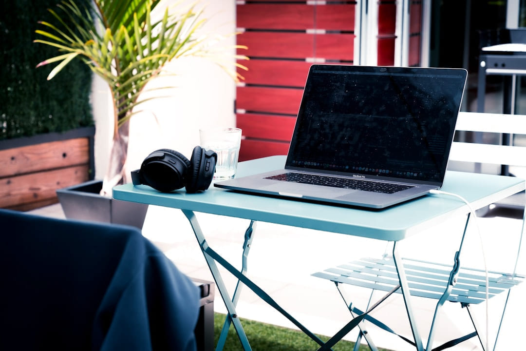 black laptop computer on white table on The Anywhere Office