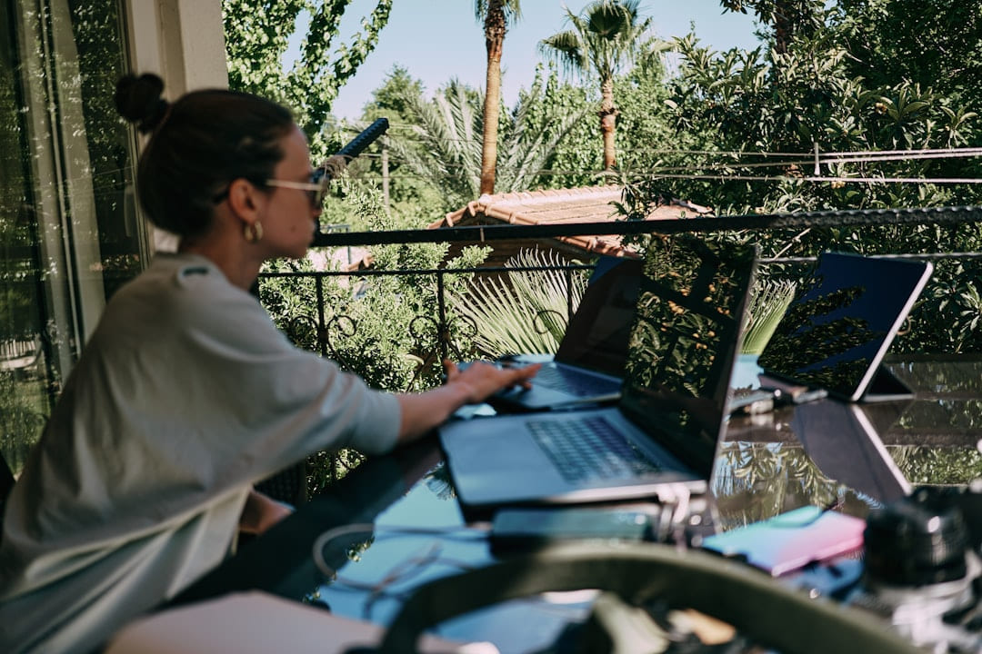 a person using a laptop on The Anywhere Office